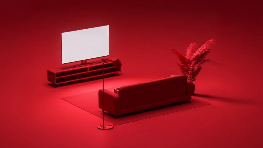 Red living room with couch and TV