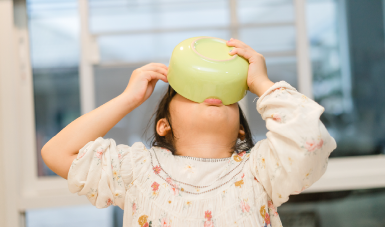child eating from a bowl