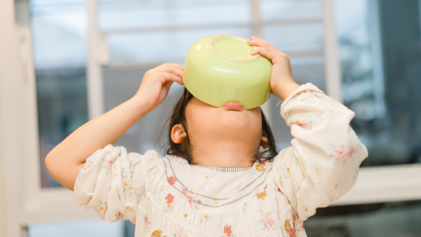 child eating from a bowl