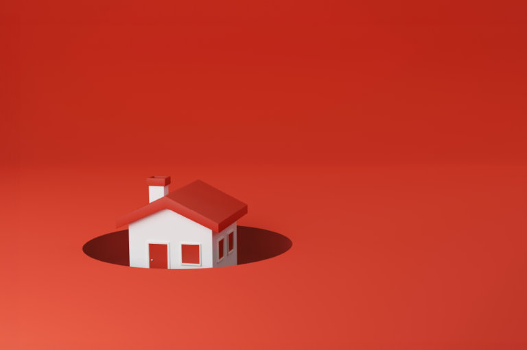 white house with a red roof coming out of a hole in the ground, on a solid red background
