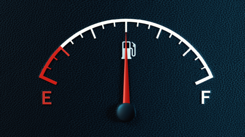 car fuel gauge, pointing directly in the middle