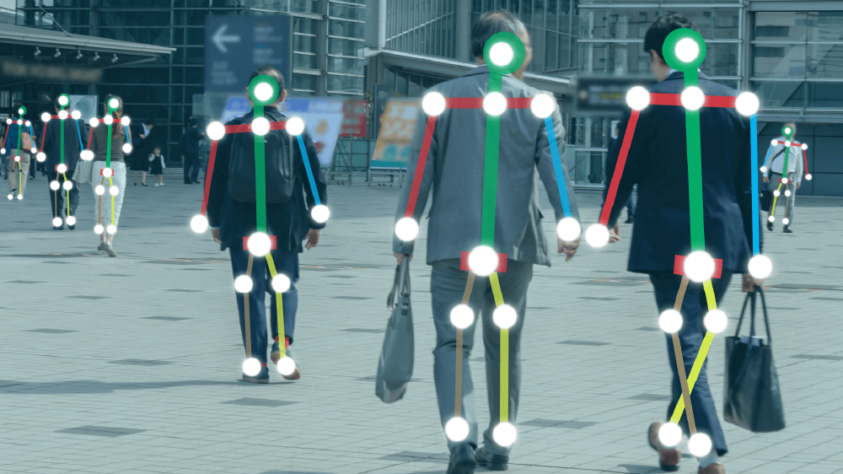 people walking down the street with colored lines layered over their bodies