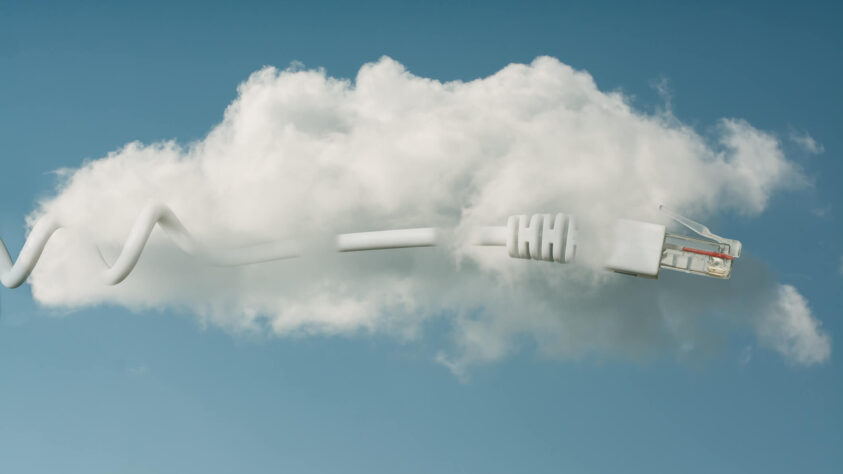 ethernet cable intertwined with a cloud in the sky