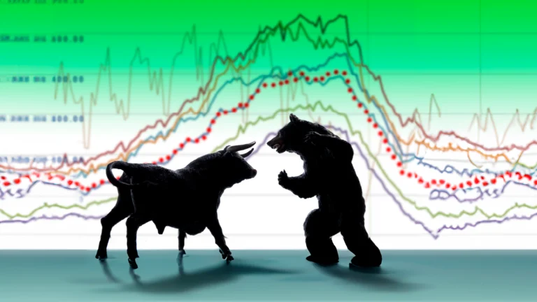 Silhouette of a bull and a bear with financial charts in the background