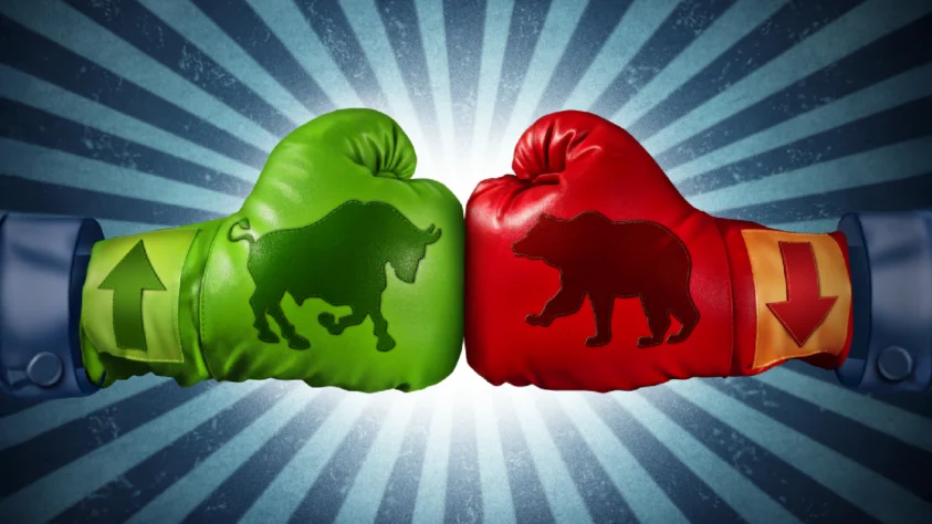 Green boxing glove with a bull. punching a red boxing glove with a bear