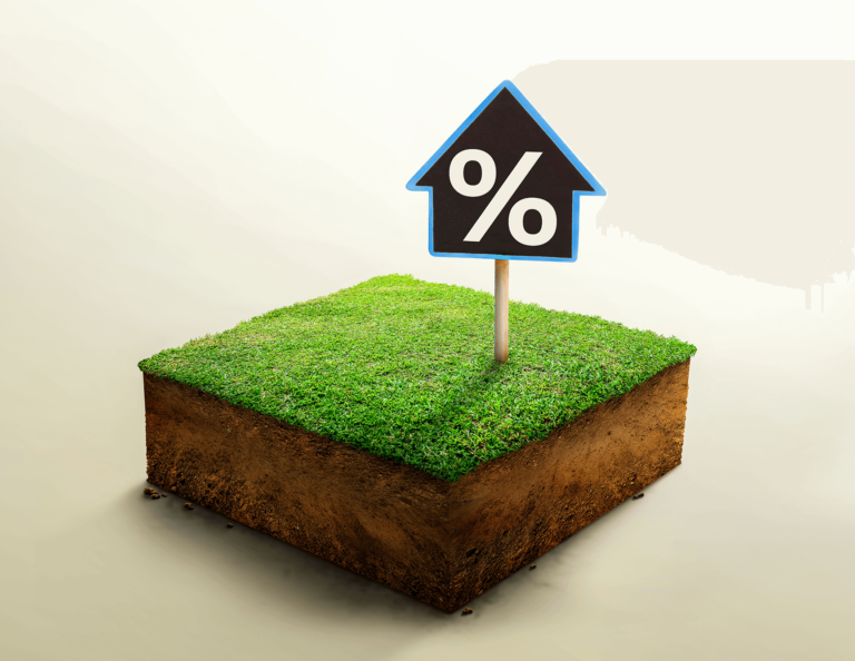 A square plot of dirt and grass, with a house-shaped black sign sticking out, with a percentage sign on it