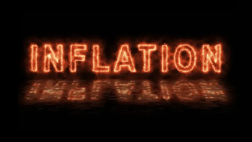 black background, with the word INFLATION written in flames