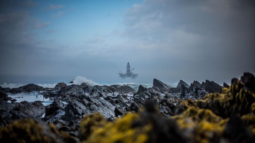 Rough Weather Impacting Oil Derrick Production.