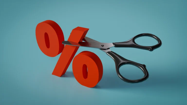 Image of scissors cutting a percentage sign